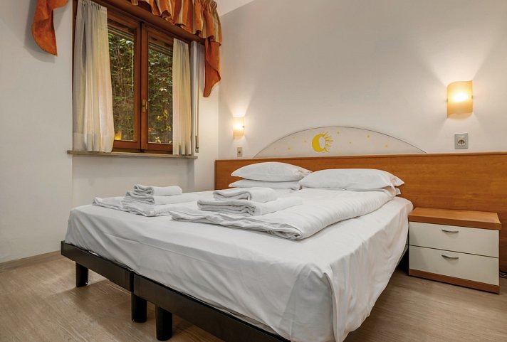 Hotel Smeraldo - Wohnbeispiel Doppelzimmer Bergblick (Zimmercodierung DB7)